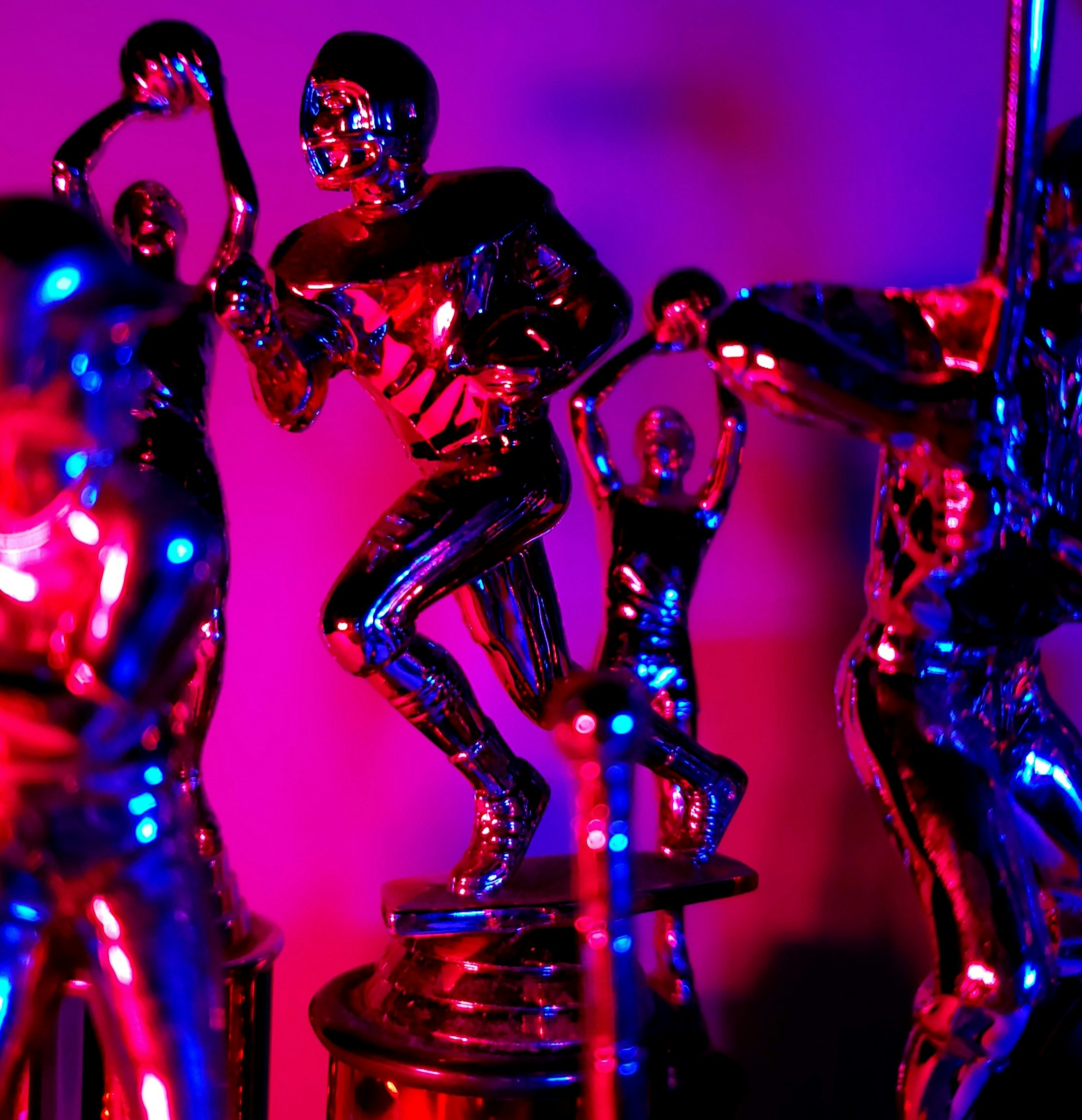 Trophies lit in blue and pink